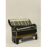 A vintage Italian bellow accordion by Pietro W45cms