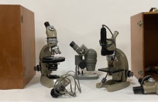 Two Vickers Instruments microscopes, and an Olympus Tokyo binocular microscope, all in fitted