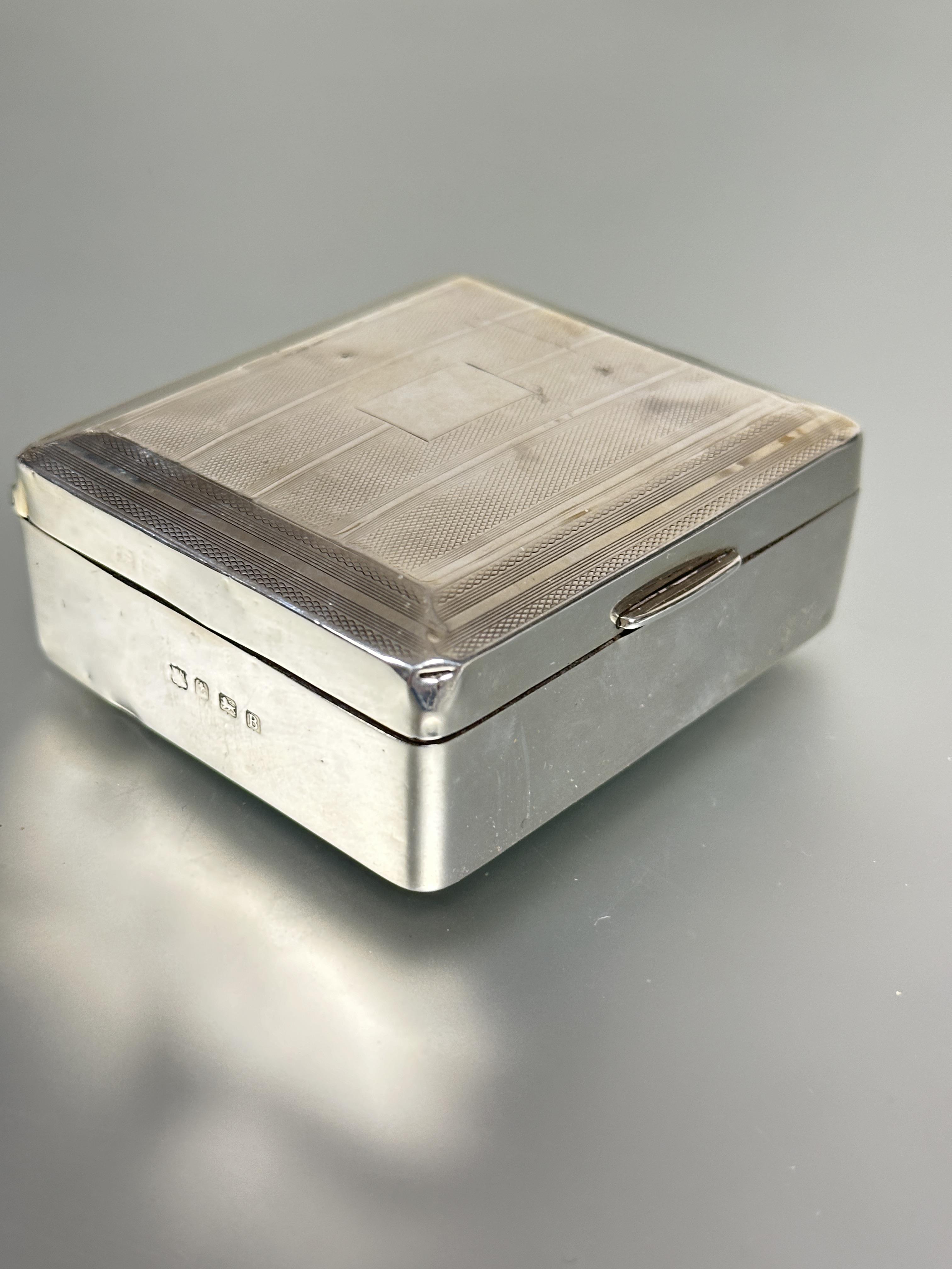 A Birmingham silver cigarette box the top with engine turned decoration enclosing a cedar lined - Image 2 of 3