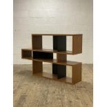 Habitat, a contemporary walnut veneered a-symmetrical open shelf. H10cm, W156cm D35cm.