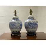 A pair of Chinese style blue and white ceramic ginger jar form lamp bases. H43cm.
