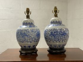 A pair of Chinese style blue and white ceramic ginger jar form lamp bases. H43cm.