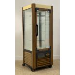 A Scaiola refrigerated patisserie / cake display cabinet with five revolving tiers, moving on