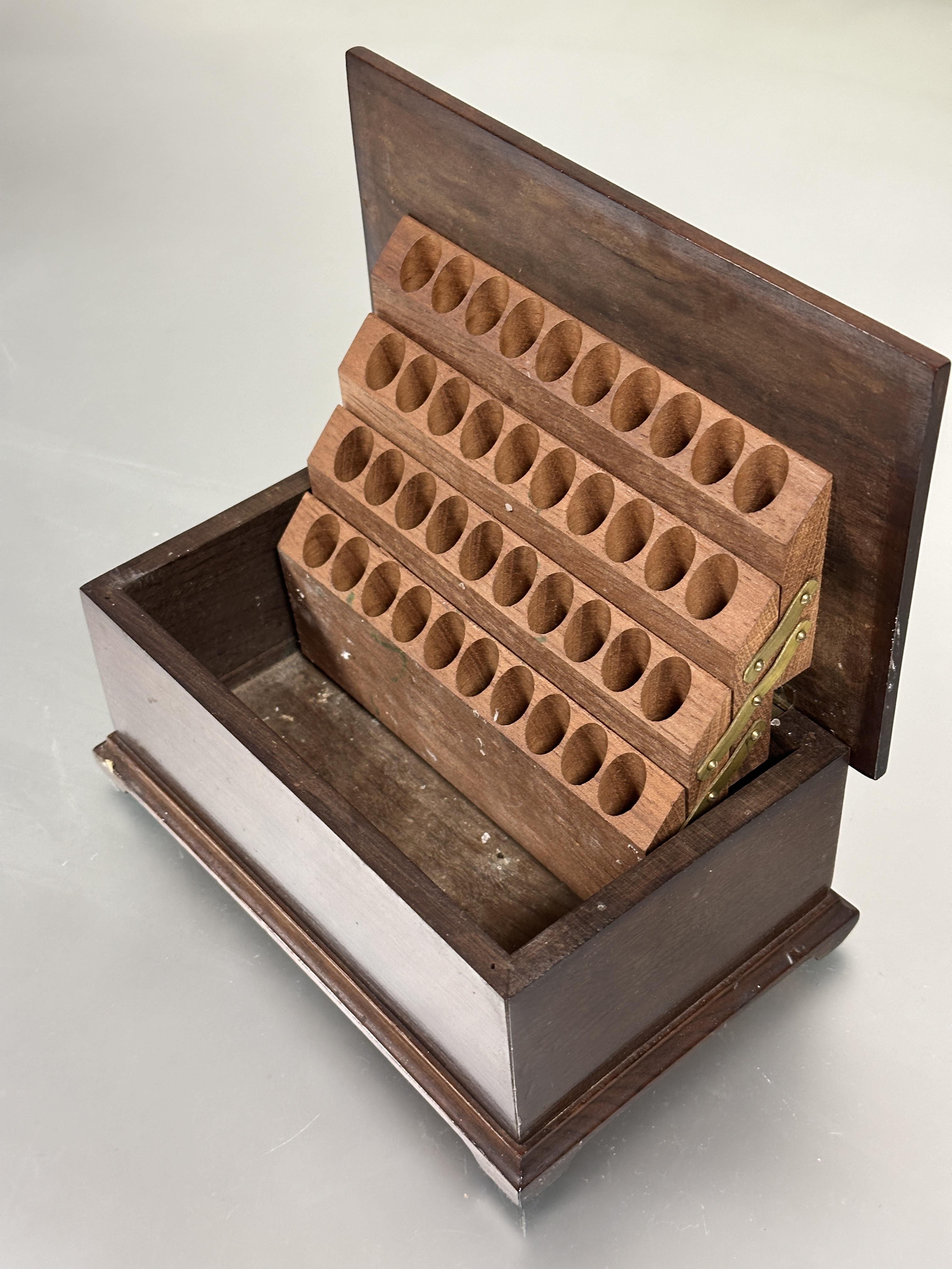 A 1920s hand made walnut cigarette box, the hinged top enclosing a rise and fall dispenser for forty - Image 2 of 2