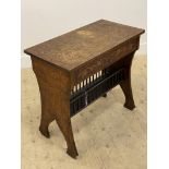 An early 20th century pokerwork side table, with rectangular top above frieze drawer and under