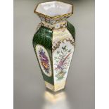 A early 20thc Dresden hexagonal tapered vase with gilt lip to top and alternation oval floral hand