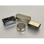 A collection of three snuff boxes to include and white metal rectangular box with engine turned