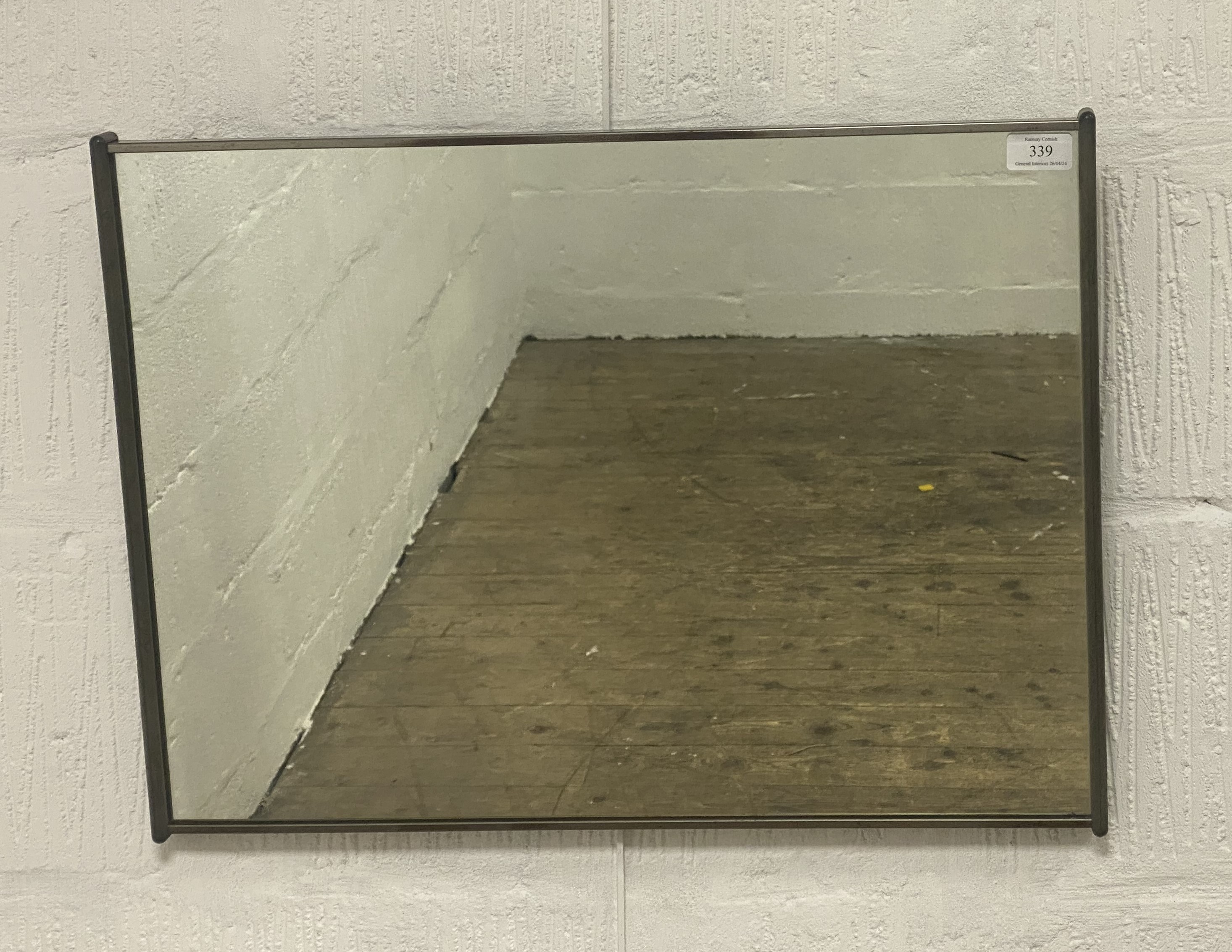 A mid century wall hanging mirror. 59cm x 45cm.