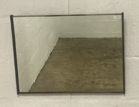 A mid century wall hanging mirror. 59cm x 45cm.