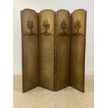 A Victorian three fold painted leather room divider, each panel decorated with urns issuing a