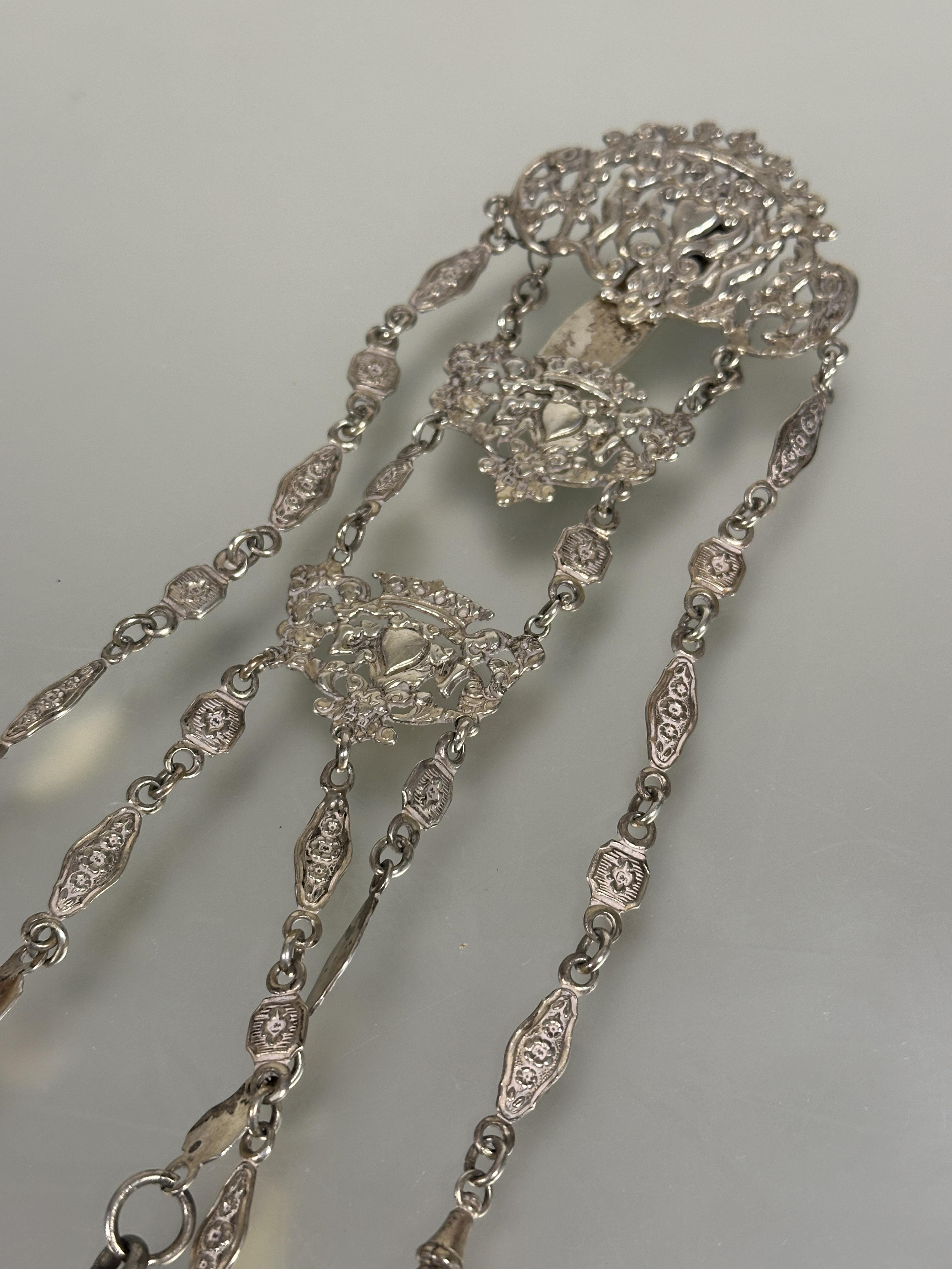 A Edwardian Birmingham silver Chatelaine the pierced top with cherubs above two panels with heart - Image 3 of 5