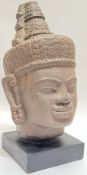A decorative Khmer/Thai-style resin/polymer bust of Gautama Buddha, mounted on plinth (h- 39cm, w-