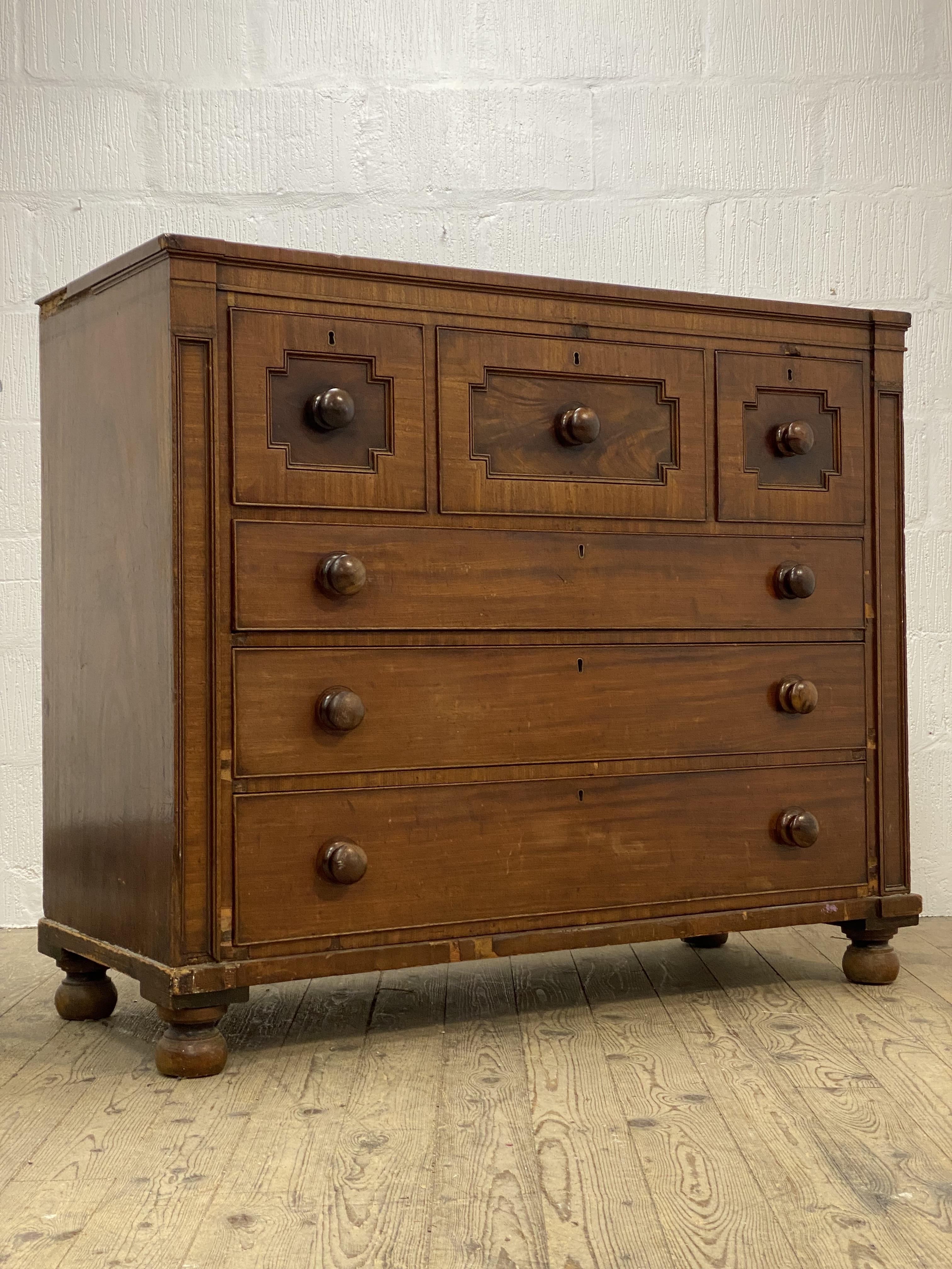 A Scottish Georgian mahogany chest, fitted with three short and three long graduated drawers, raised