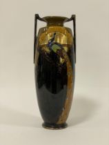 An Art Deco Phoenix ware twin handled vase by Thomas Forester Ltd., Cira 1920's,having a flared