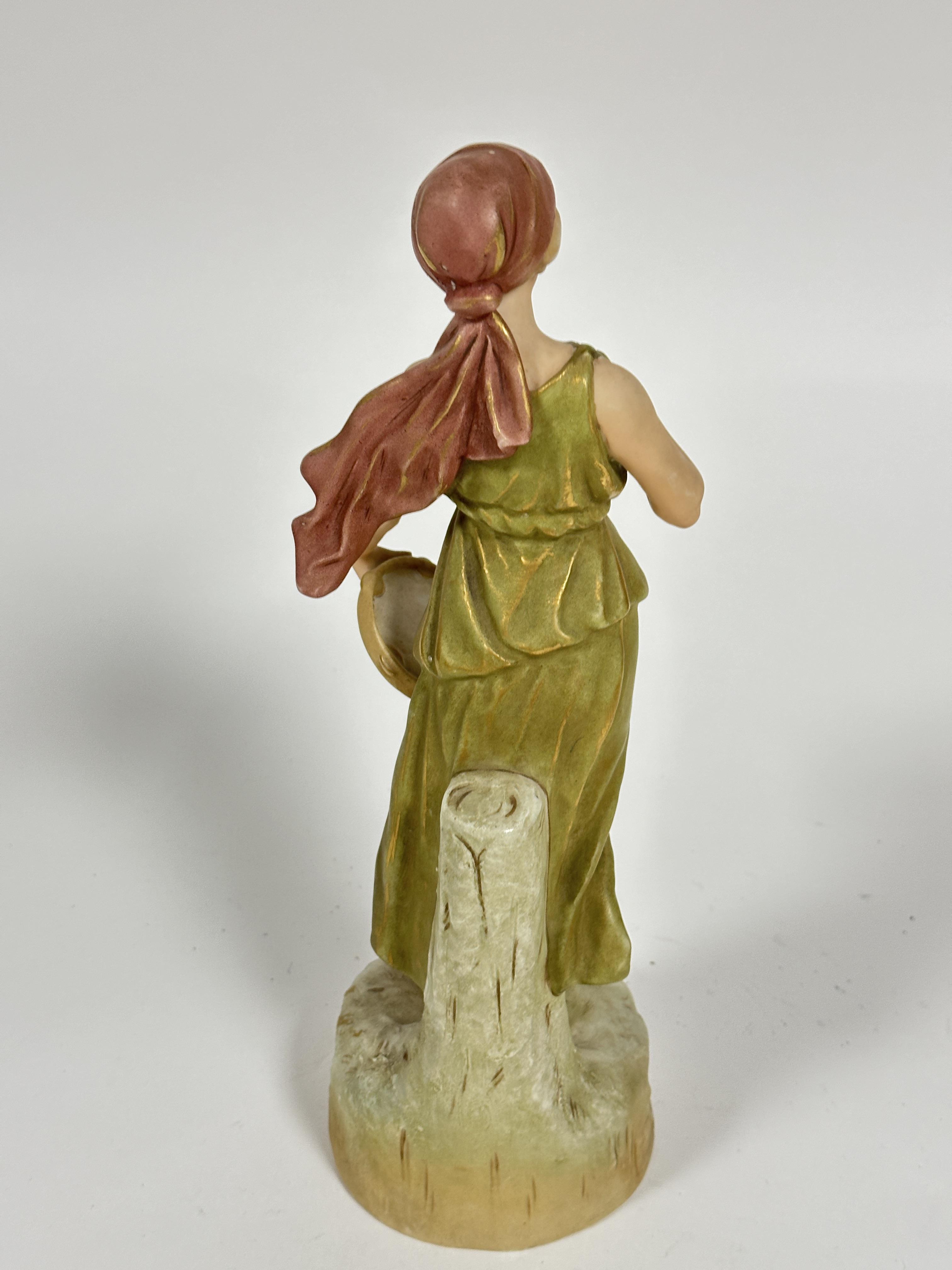 A Austrian Royal Dux figure of a maiden with tambourine in green tunic standing on circular - Image 3 of 5