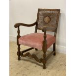 A walnut open armchair of 17th century design, circa 1930's, the back rest with bergere panel