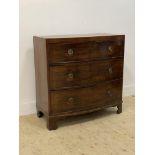 A Regency mahogany bow front chest, fitted with three graduated drawers and raised on bracket
