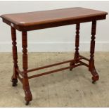 A Victorian stained mahogany stretcher table, the rectangular top raised on four turned and