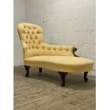 A Victorian mahogany framed spoon back chaise longue, well upholstered in deep buttoned pale