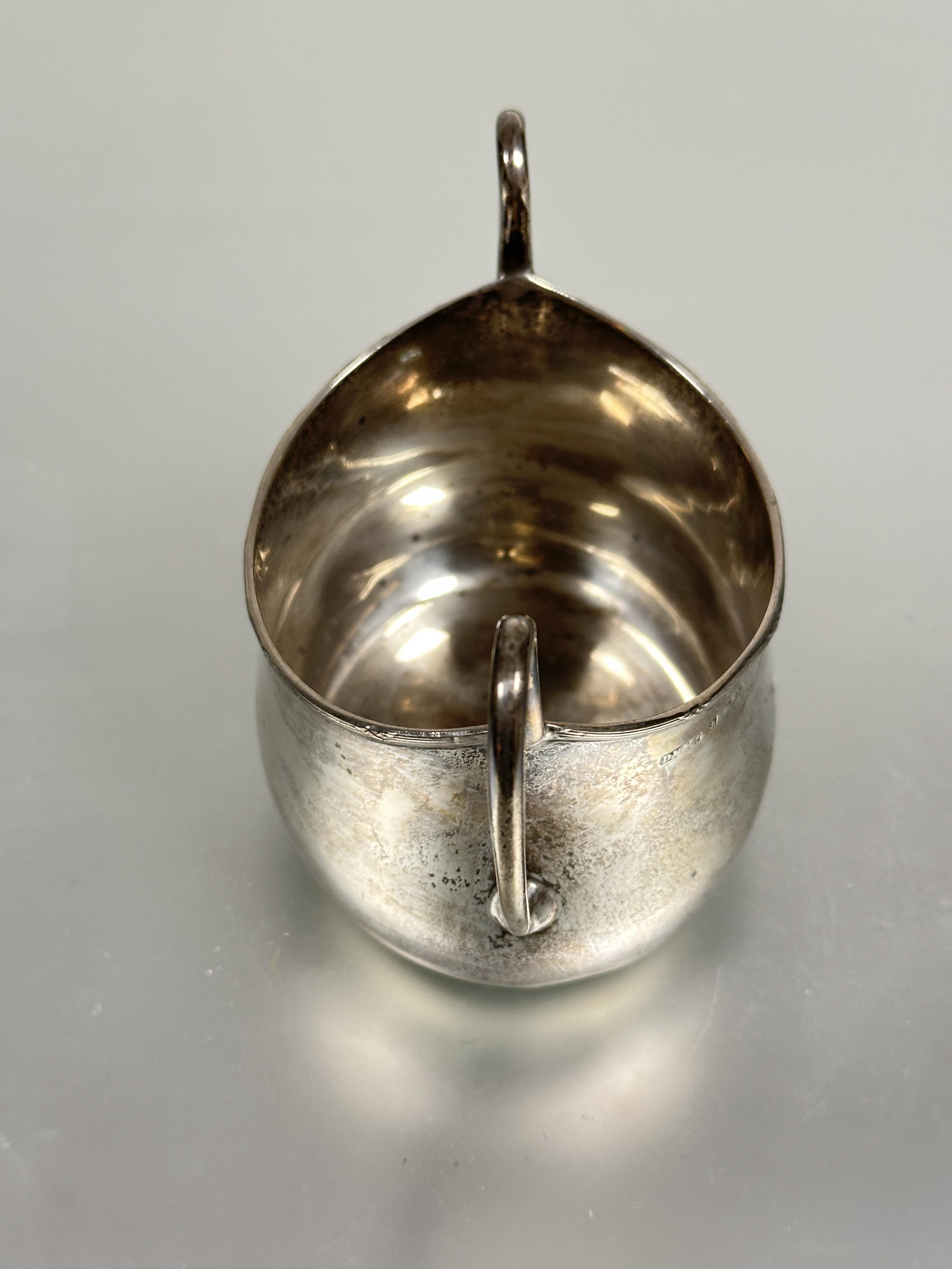 A Edwardain Birmingham silver oval two handled sugar bowl with reeded border to top engraved with - Image 2 of 4