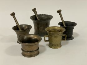 A group of 18th and 19th century bronze mortar and pestles (5)