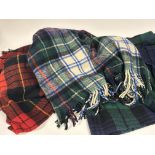 A group of Tartan throws/blankets comprising, a British Made, green, black and blue all wool