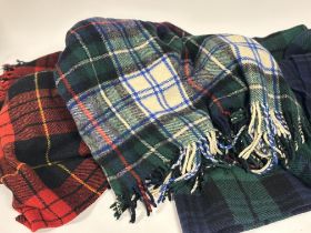 A group of Tartan throws/blankets comprising, a British Made, green, black and blue all wool