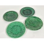 A pair of Wedgwood style vine leaf pattern green glazed dessert plates no signs of damage or cracked