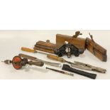 A small group of vintage tools, to include; a Stanley No. 71 router plane, three moulding planes,