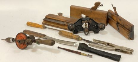 A small group of vintage tools, to include; a Stanley No. 71 router plane, three moulding planes,