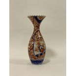 A Japanese Meji/Taisho Imari patterned vase, the crimped flared rim with floral decorated panels, (