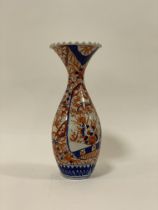 A Japanese Meji/Taisho Imari patterned vase, the crimped flared rim with floral decorated panels, (