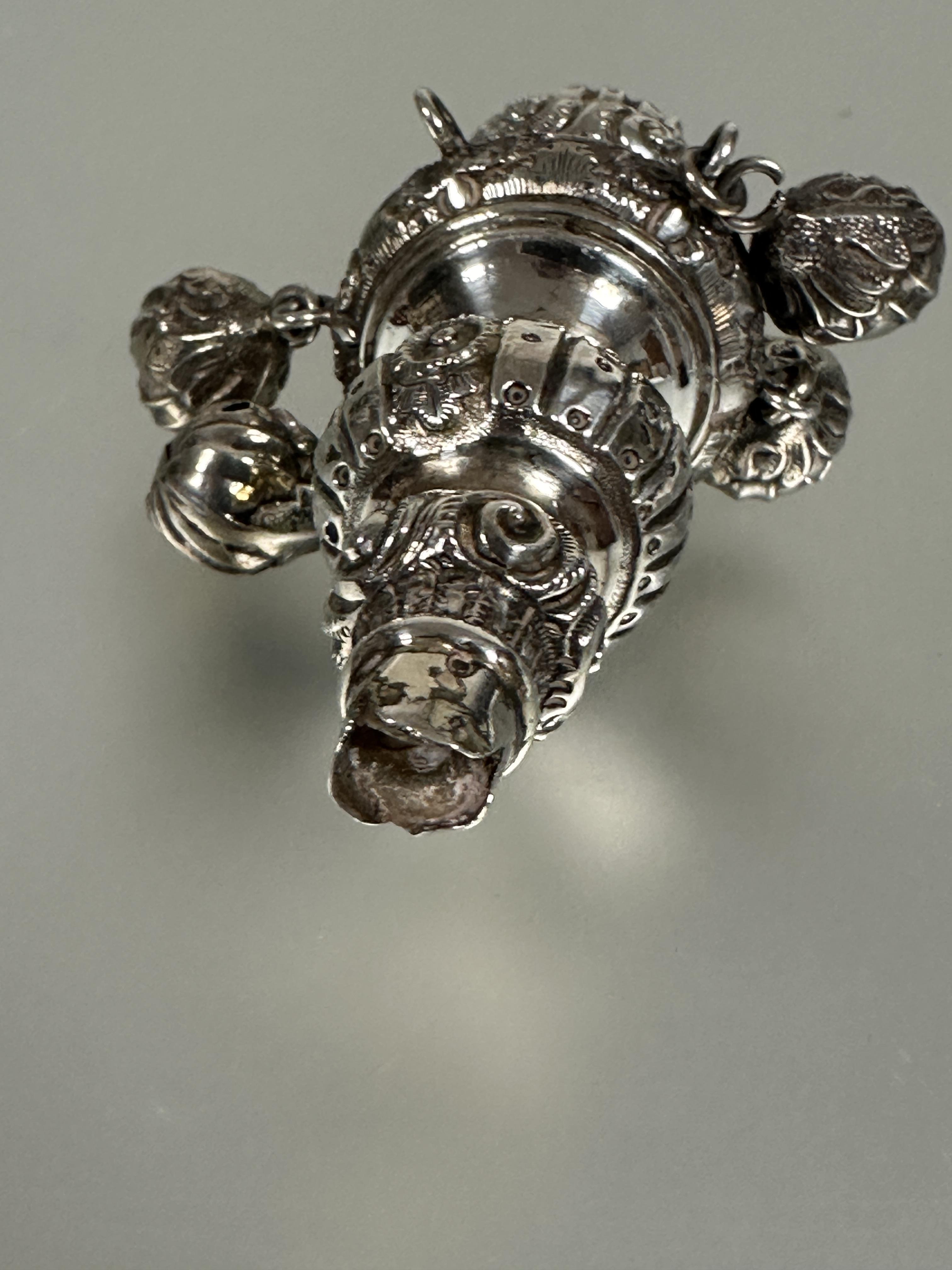 A 19thc white metal child's teething rattle/whistle of typical tiered form with cased scrolling - Image 3 of 3