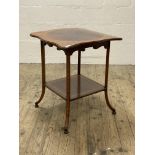 An Edwardian mahogany occasional table, the serpentine top with deep satinwood band raised on square