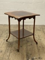 An Edwardian mahogany occasional table, the serpentine top with deep satinwood band raised on square