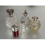 A large Victorian crystal slice cut flared perfume bottle with Birmingham silver hinged mounted
