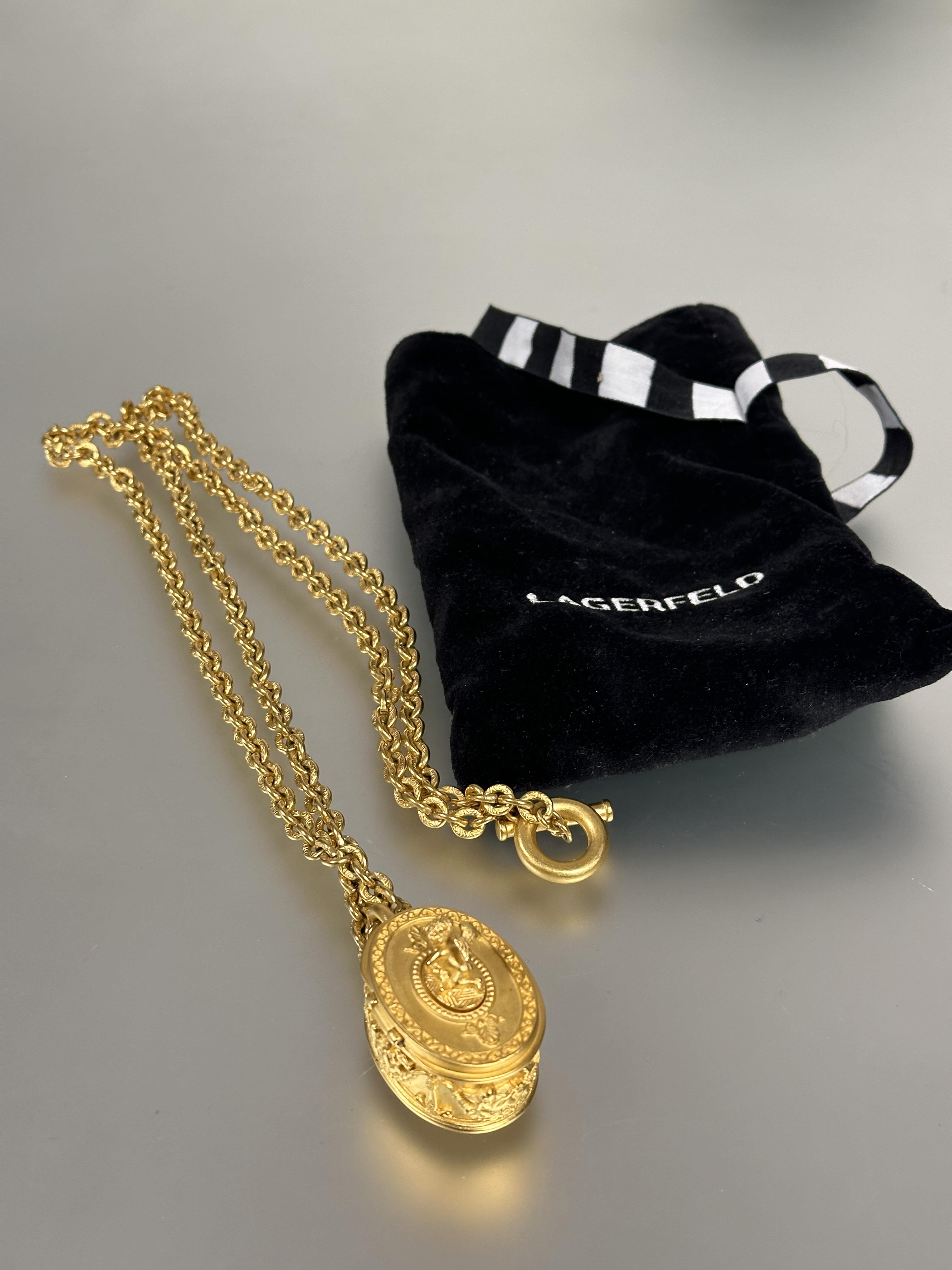 A vintage Karl Lagerfeld 1980s- 90s gilt oval pill box pendant on oval link chain, the hinge top - Image 3 of 3