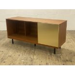 Habitat, a contemporary sideboard / media stand, the brass panelled door opening to a shelf, and