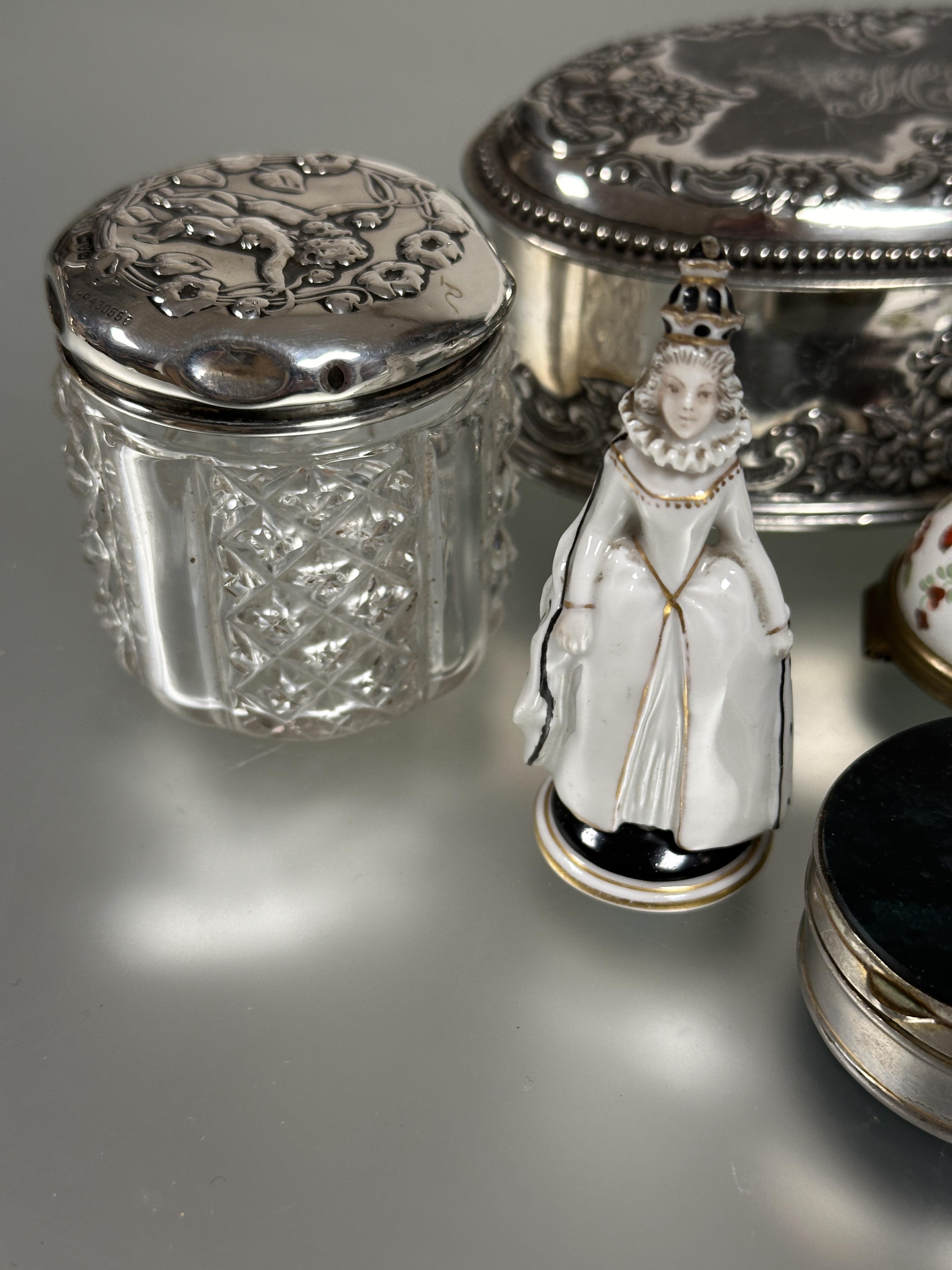 A crystal slice cut glass panel sided ointment jar with Chester silver chased top depicting two - Image 2 of 4