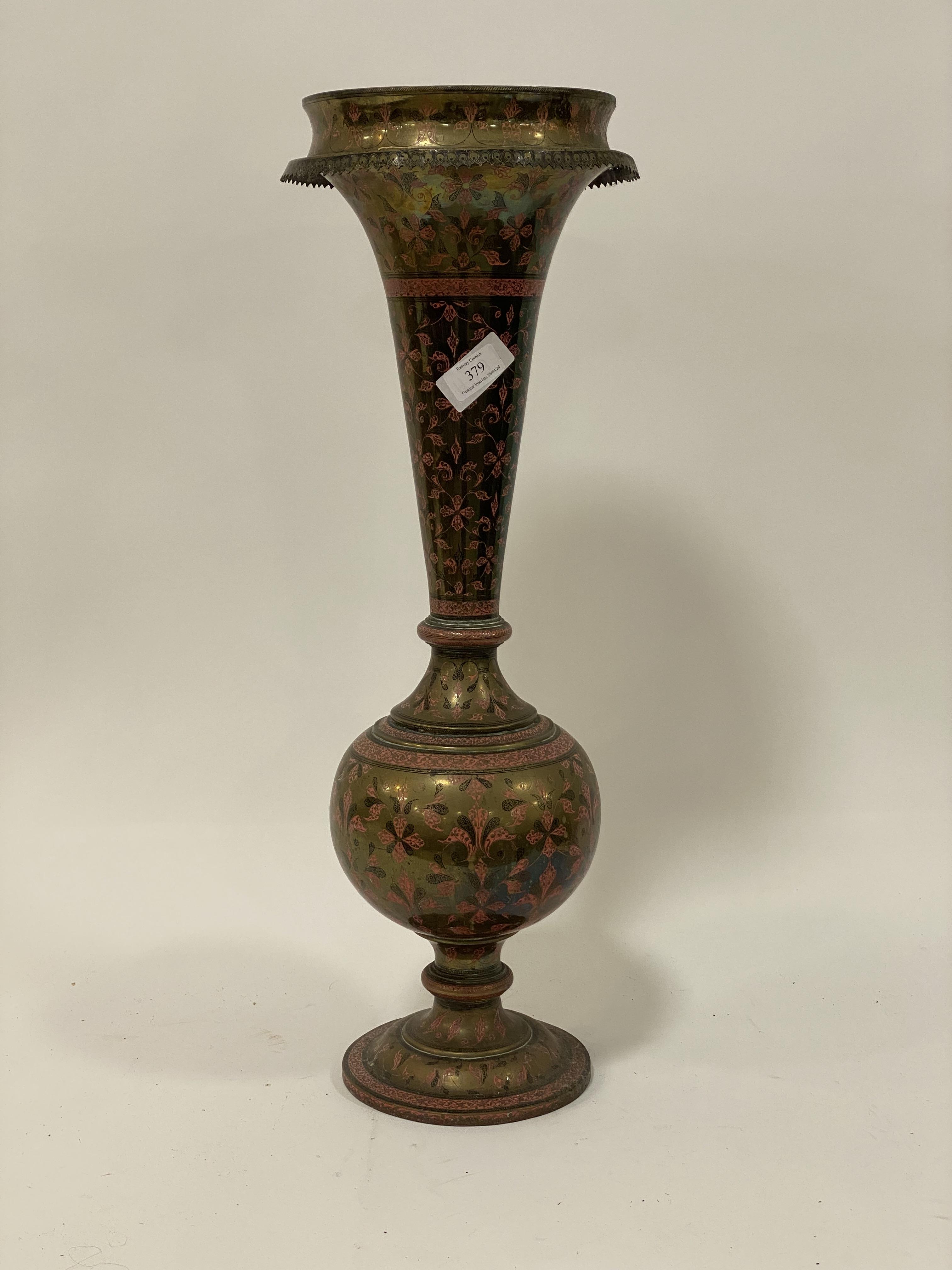 An early 20th century Indo-Persian brass and nielo ware vase of trumpet form. H66cm.