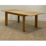 Afra and Tobia Scarpa for Molteni, a large oak extending dining table with magic leaf to centre,