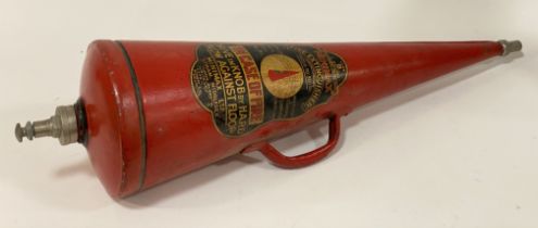 A Minimax Fire extinguisher,  red painted conical body with handle to side 85cms