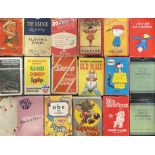 A group of seventeen vintage sets of novelty playing cards including Peanuts, Charlie Brown, Snoopy,