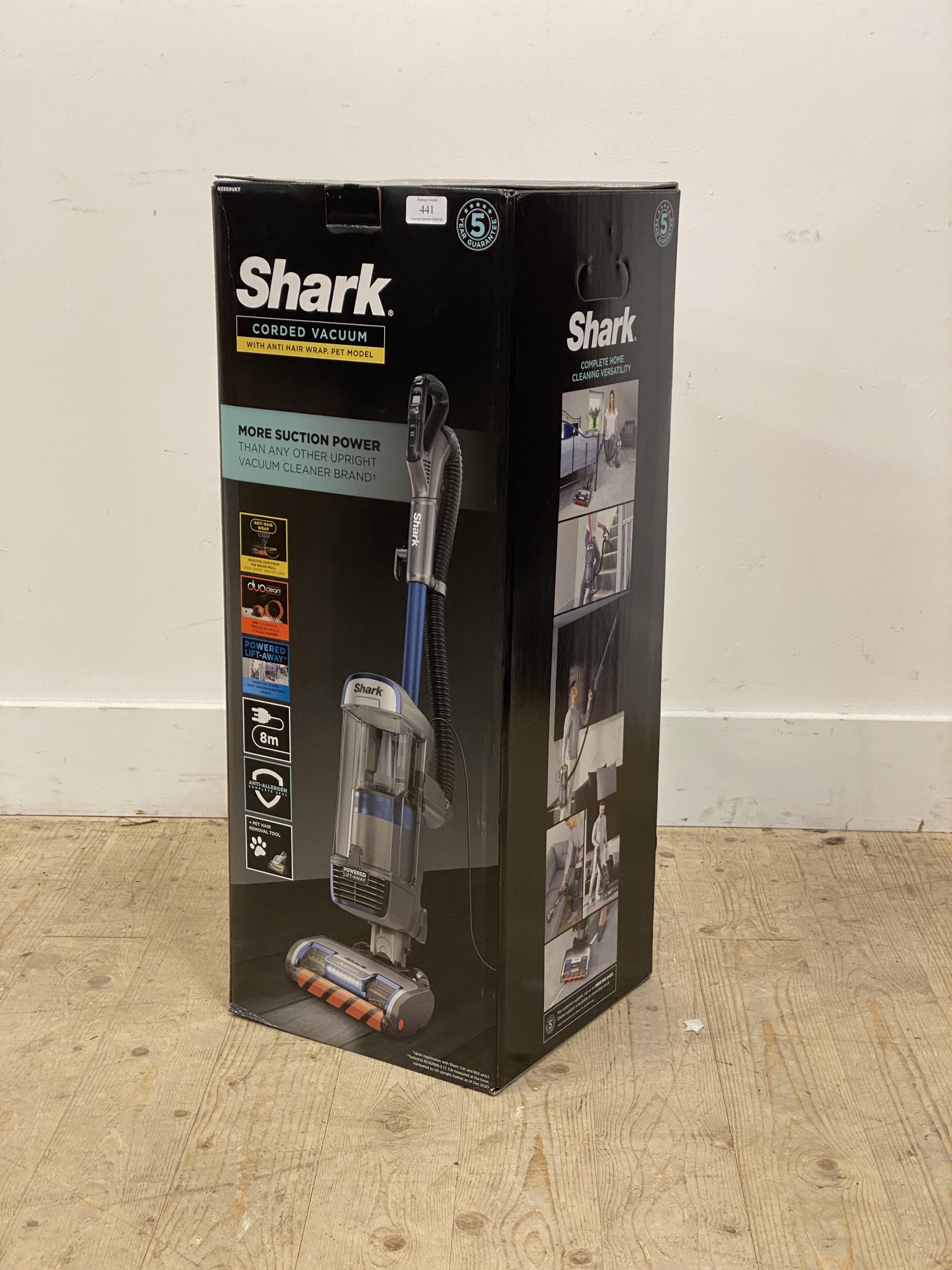 A shark corded vacuum cleaner in box (as new)