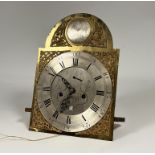 A George III longcase clock movement and dial, the arched brass dial with roundel inscribed '