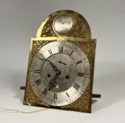 A George III longcase clock movement and dial, the arched brass dial with roundel inscribed '