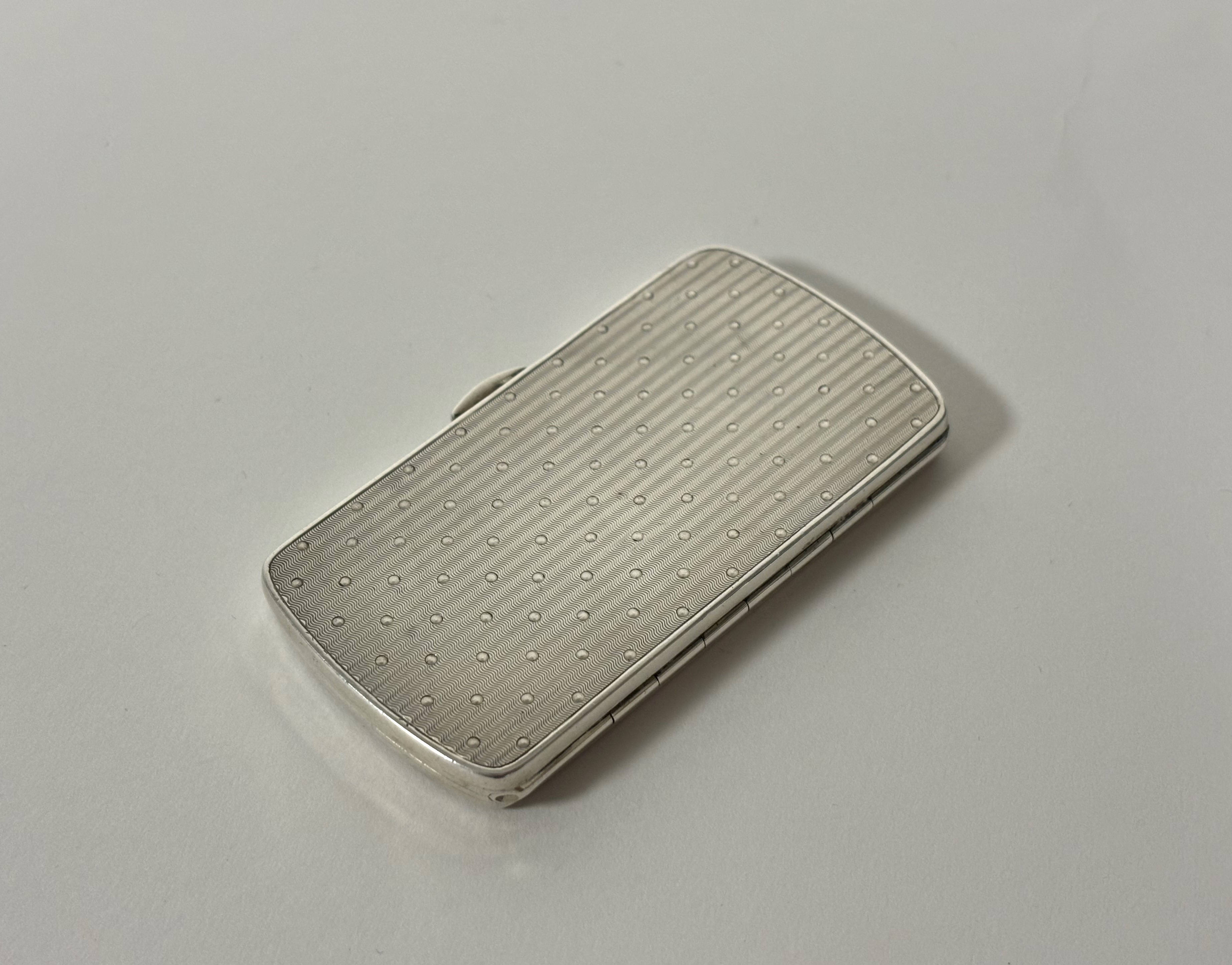 A George V silver card case, William Neale, Birmingham 1911, of rectangular form, with engine-turned - Image 3 of 3