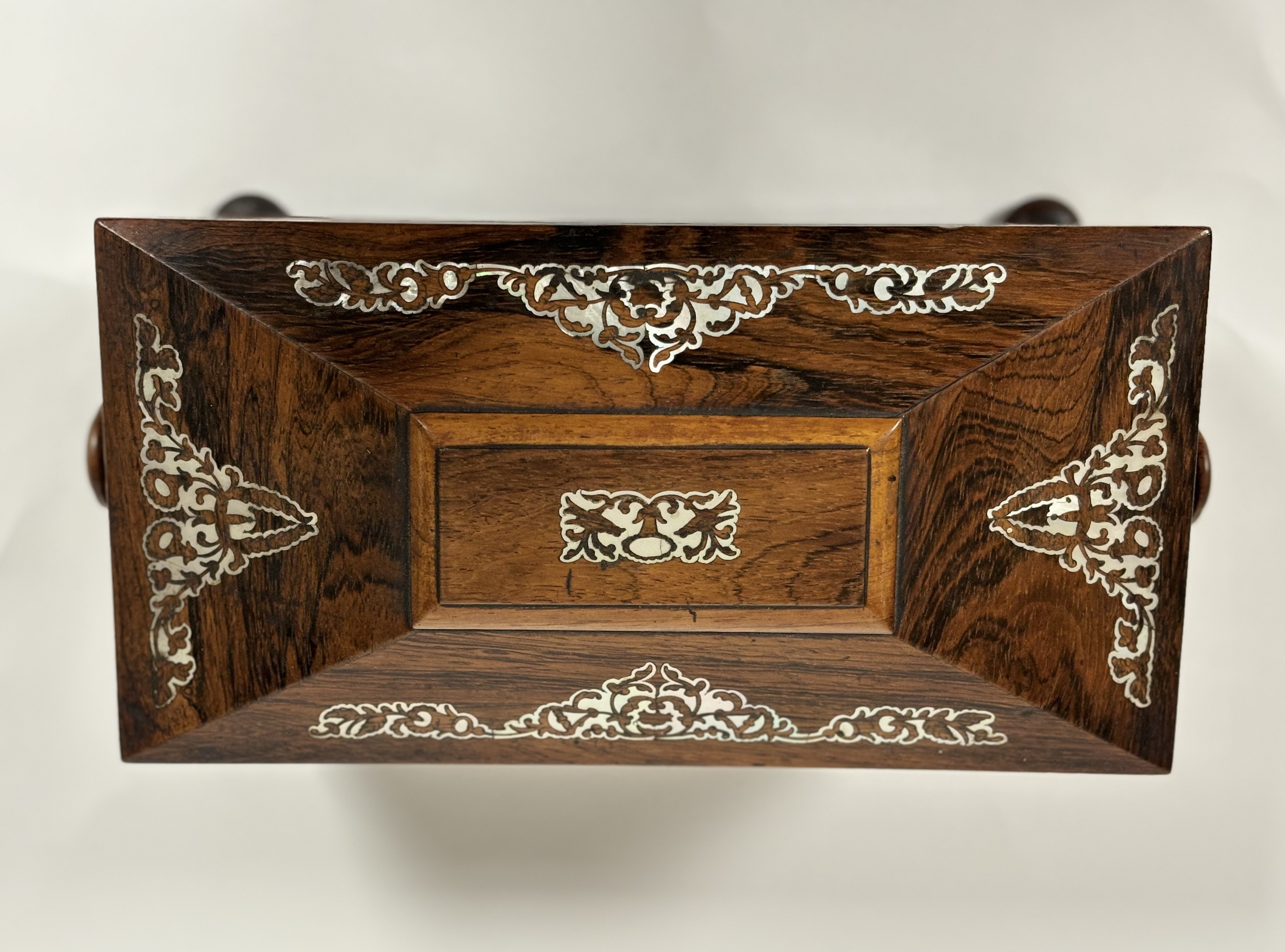 A William IV mother-of-pearl inlaid rosewood tea caddy, of sarcophagus shape, with turned handles - Image 3 of 8