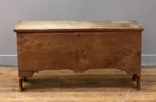 An English oak six plank coffer, late 18th century, the hinged lid opening on strap hinges to an