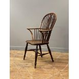 A Thames Valley beech, elm, and ash Windsor elbow chair, 19th century and later, the double hoop,